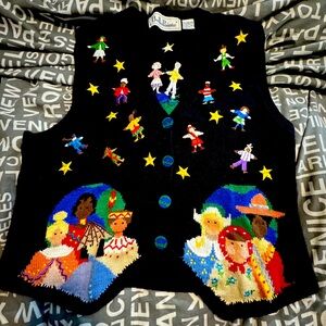 Vintage woman’s gently worn Around the World themed sweater